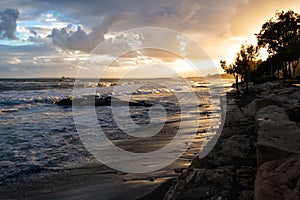 Beach during a stormy weather at sunset in Limassol. Cyprus