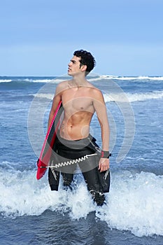 Beach summer beach portrait of young surfer