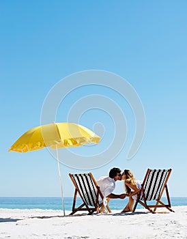 Beach summer umbrella kiss