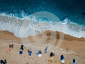 Beach with sun loungers on the coast of the ocean