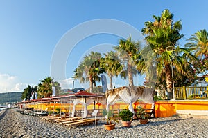 Beach with sun loungers in Kemer