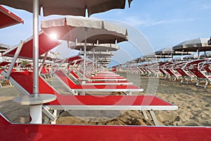 Beach with sunbed and umbrella in Rimini and Riccione, Italy