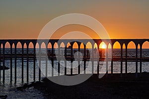 Beach sunset on the bridge of Civitavecchia