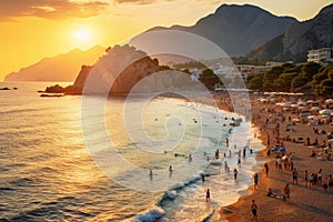 Beach at sunset in Budva, Montenegro, Europe, Kaputas beach. People enjoy sun and sea at the beautiful turquoise sea and sandy