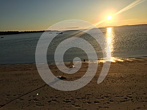 Beach sunset with buoys