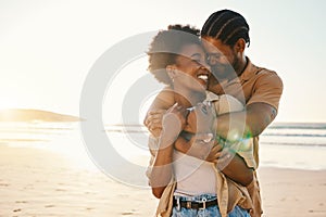 Beach sunset, love and happy black couple hug, sunshine and enjoy bonding time together on romantic Nigeria date