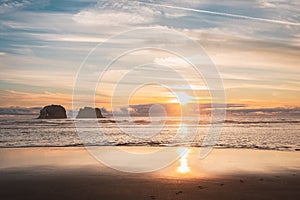 Beach Sunset Views. Twin Rocks at Rockaway Beach, Oregon during beautiful summer sunset Pacific ocean