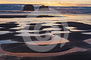 Beach Sunset Views. Twin Rocks at Rockaway Beach, Oregon during beautiful summer sunset Pacific ocean