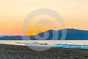 Beach on sunset in village Kavros in Crete island, Greece. Magical turquoise waters, lagoons.