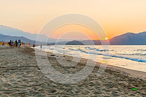 Beach on sunset in village Kavros in Crete island, Greece. Magical turquoise waters, lagoons.