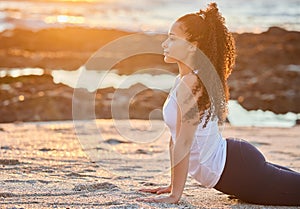 Beach, sunset and woman with stretching in yoga for muscle relief, balance or mindfulness. Healthy workout, zen and