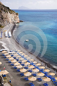 Beach with sunshade umbrellas