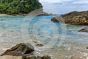 Beach surrounded by rainforest of the tropical paradise of Trindade