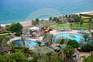 The beach and swimming pools at luxury hotel