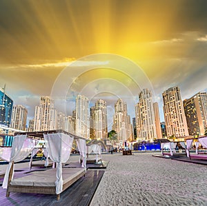 Beach Tents and Dubai Marina Skyline at dusk