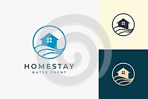 Beach theme residence or apartment logo with ocean wave and circle