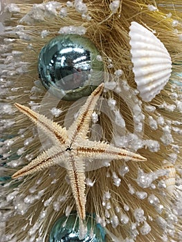 Beach themed Christmas decorated tree closeup