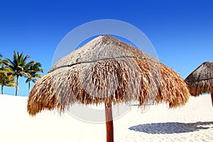 Beach traditional sunroof hut caribbean umbrellas