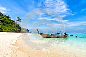 Beach with traditional thailand longtale boat.Bamboo island, Thailand