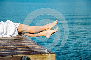 Beach travel - woman feet
