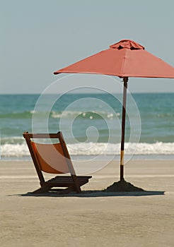 Beach umbrella and chair