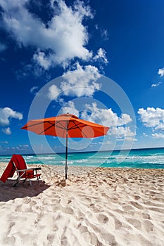 Beach umbrella and chair