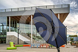 Beach umbrella before Gilles Vigneault Theater  in La Place de la Gare