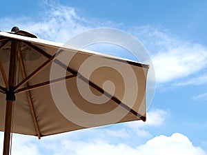 Beach umbrella isolated on blue sky