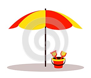 Beach umbrella and sand bucket