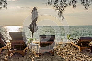 Beach umbrella and sunbath seats on Pak Weep beach