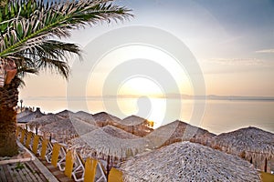 Beach at sunset in Hanioti, Greece.