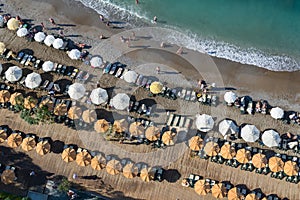 Beach with umbrellas aerial view