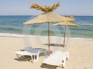 Beach umbrellas and beads on sea beach