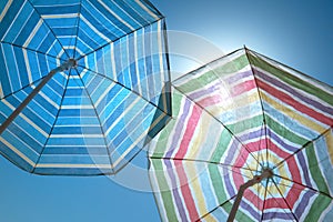 Beach Umbrellas On A Blue Sky