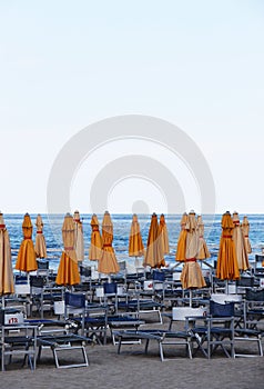 Beach umbrellas and chairs, bathhouse