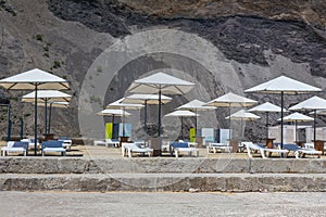 Beach umbrellas and deck chairs on the beach