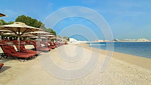 Beach with umbrellas in Ras al Khaimah. September 2018