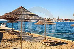 Beach umbrellas in Saint Nicholas island, Porec