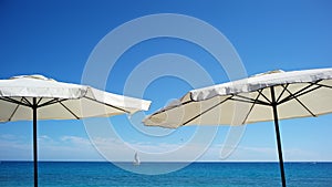 Beach umbrellas at seashore