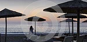 Beach Umbrellas with sunset