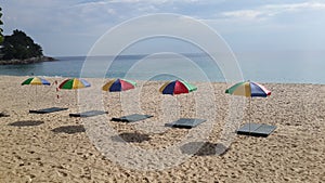 Beach umbrellas on Surin beach, Puket, Thailand photo