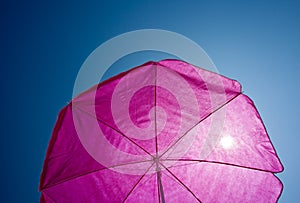 Beach umrella with blue sky