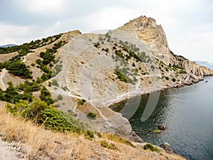 The beach under the mountain