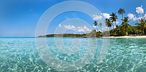 Beach vacation holidays landscape panorama of tropical paradise island with turquoise blue transparent sea water, pristine coast,