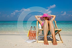 Beach vacation. Hot beautiful woman enjoying looking view of beach