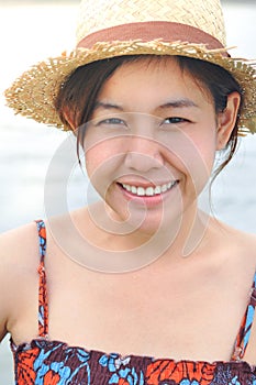 Beach vacation woman in sun smiling happy on summe