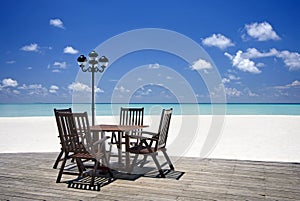Beach veranda with table and chairs