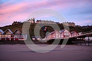 On the beach at Victorian Saltburn during sunset