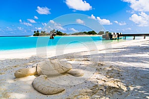 Beach view at Four Seasons Resort Maldives at Kuda Huraa photo