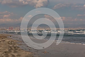 Beach view with white topped waves at Ladys Mile in Limassol